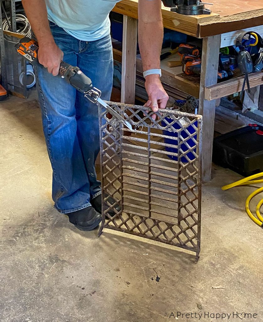 An antique grate hung on the wall unique wall art.